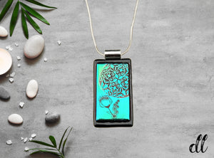 Dichroic Fused Glass Blue Green Mandala Rectangle Pendant with Etched Blue Design and Decal Flower Dichroic Fused Glass Blue Green Mandala Rectangle Pendant with Etched Blue Design and Decal Flower