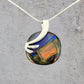 Dichroic Fused Glass Black Blue Orange Gold Round Pendant in a Gorgeous Silver Setting