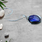 Dichroic Blue Fused Glass Round Pendant set in a Stunning Silver Setting