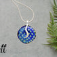 Dichroic Fused Glass Blue Patterned Dichroic Round Pendant in an Attractive Silver Setting