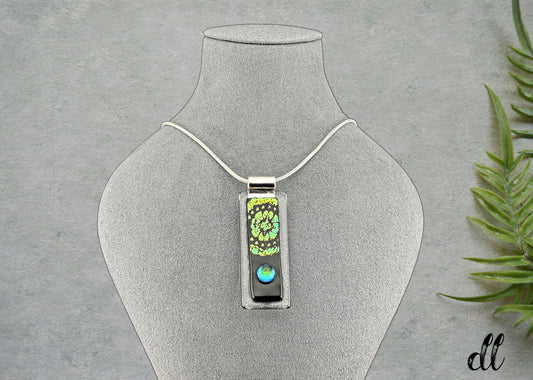 Fused Glass Blue and Green Dichroic Rectangular Pendant Etched with Mandala Designs on a Black/Clear base