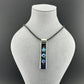 Fused Glass Pink Blue Purple Green Dichroic Long Rectangular Pendant Etched with Mandala Designs on a Black/Clear base