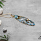 Fused Glass Blue Turquoise Brown and Vanilla Glass Long Oval Pendant with White Dragonfly Decal