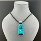 Fused Glass Blue Dichroic Rectangular Pendant Etched with Mandala Designs on a Black/Clear base