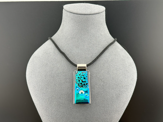 Fused Glass Blue Dichroic Rectangular Pendant Etched with Mandala Designs on a Black/Clear base