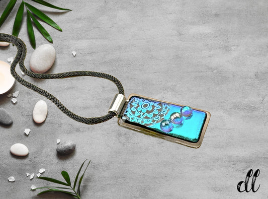 Fused Glass Blue Dichroic Rectangular Pendant Etched with Mandala Designs on a Black/Clear base